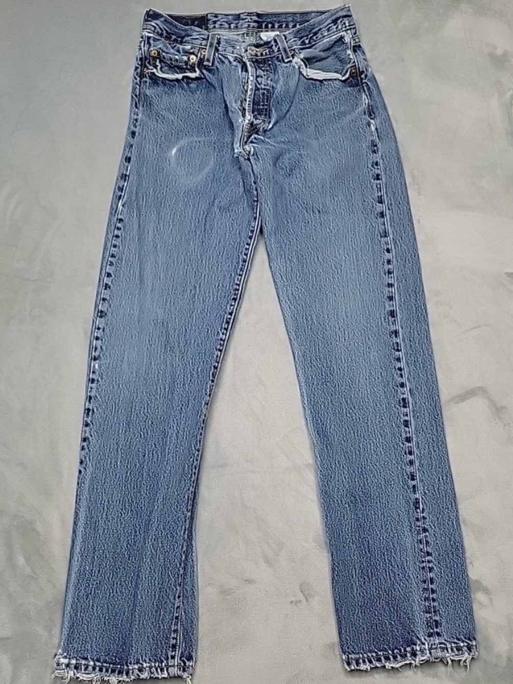 Levi’s vintage 501 button fly: 30x34. Straight leg. Distressed denim
